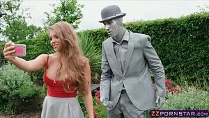 Huge-chested damsel plumbs a living statue performer outdoors